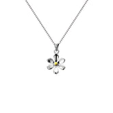 A small sterling silver daisy pendant with a polished brass centre, shown on a silver box chain against a white background.